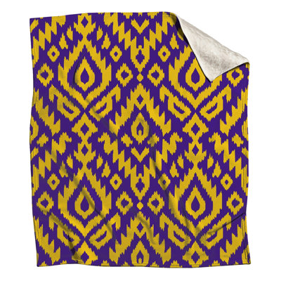 Couvertures jaunes à motif ikat