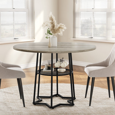 Table de salle à manger ronde peu encombrante avec tablette de rangement en filet - Base hexagonale robuste en fer noir - Table moderne en bois et métal pour 4