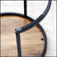Ensemble de 2 tables basses rondes gigognes avec structure métallique robuste, parfaites pour un décor moderne et industriel dans les salons et les chambres.