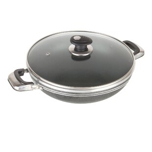 https://assets.wfcdn.com/im/73650750/resize-h310-w310%5Ecompr-r85/1310/131018481/sq-professional-una-non-stick-aluminium-wok-with-lid.jpg