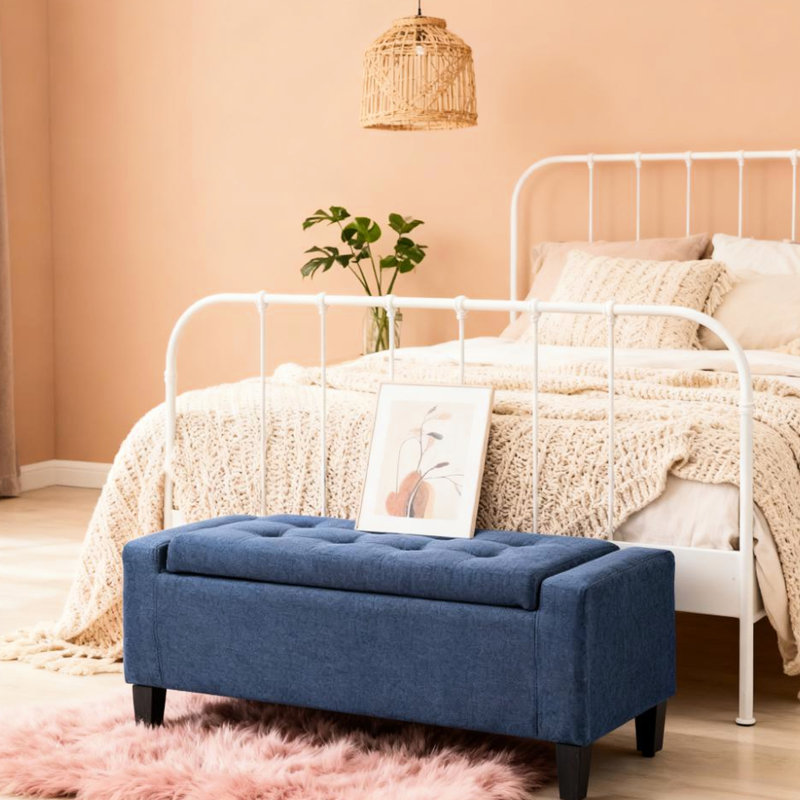 Banc de rangement avec repose-pieds en lin et capitonnage bleu foncé pour le salon