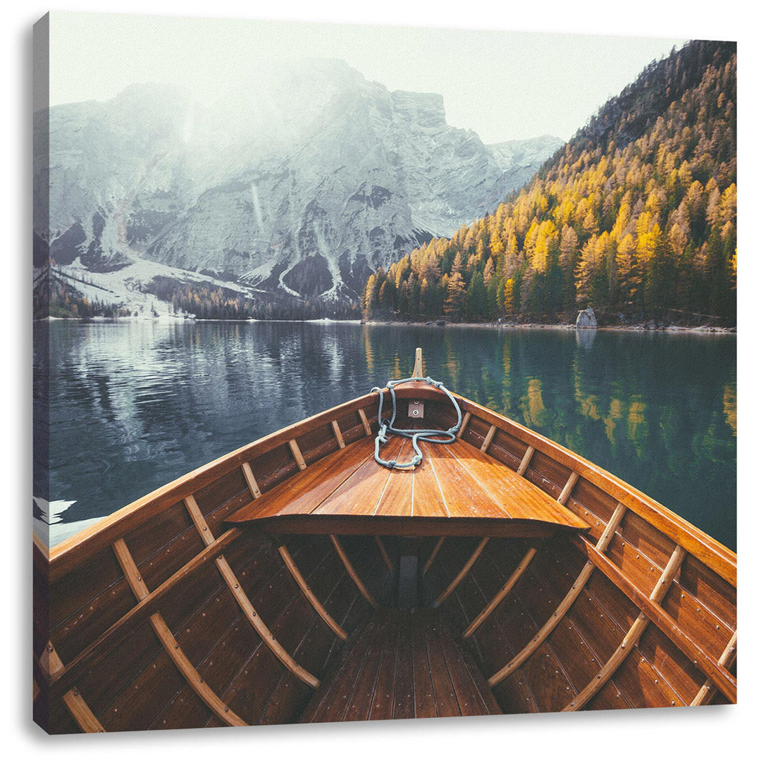 Leinwandbild Holzboot auf dem Alpensee in den Dolomiten