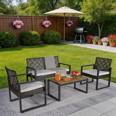 Ensemble de mobilier d'extérieur moderne 4 pièces, rotin gris clair avec plateau en bois d'acacia gris et coussins bleus pour le balcon, le porche, le jardin et la cour