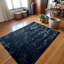 Tapis noir en fourrure de lapin_8 x 10 pi-1703583586