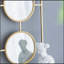Stylish Wall Mirror Set with Three Convex Mirrors in a Sleek Rectangular Frame, Ideal for Bedroom and Living Room Decor.