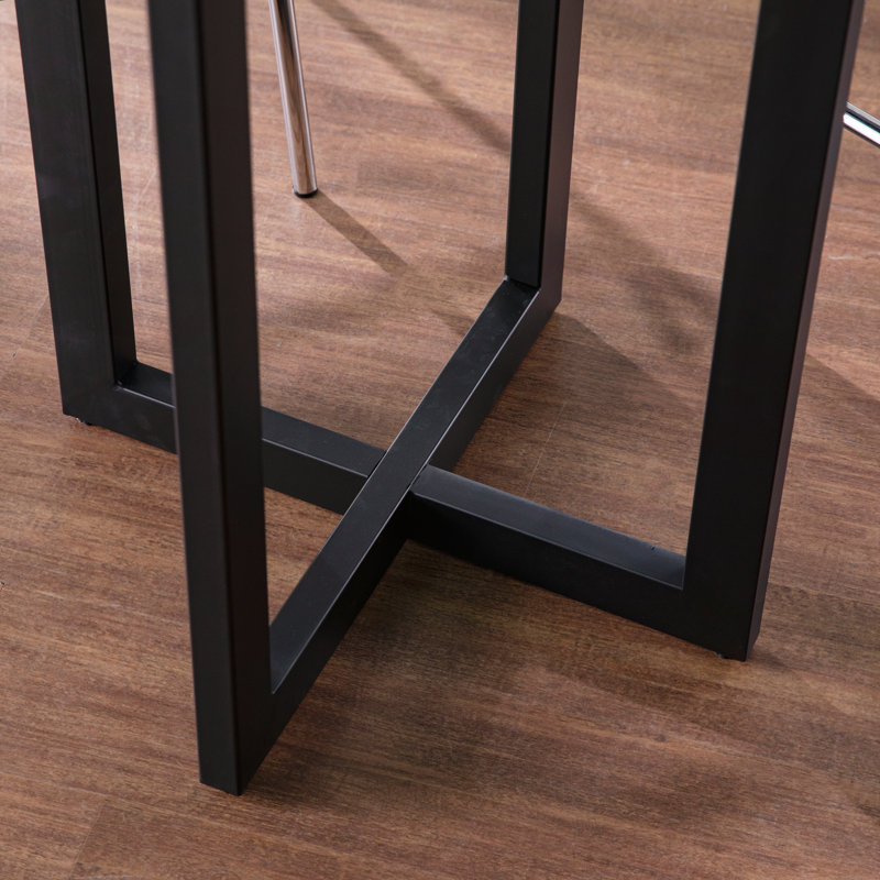 Table bistro avec plateau en chêne brûlé et base en métal noir pour petits espaces et utilisation multifonctionnelle