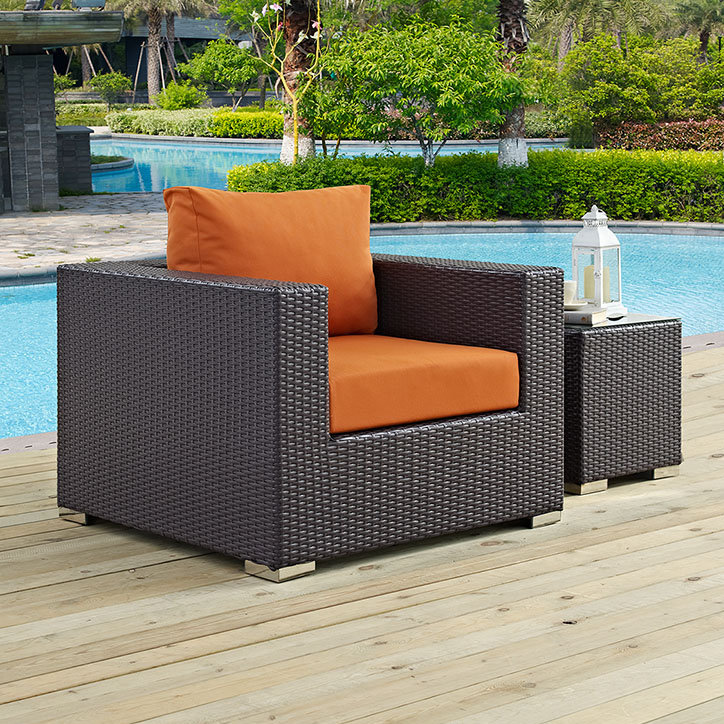 Fauteuil d'extérieur en rotin avec coussins Convene, Orange