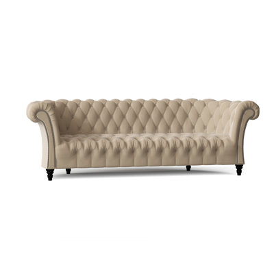 Canapé Chesterfield à accoudoirs roulés