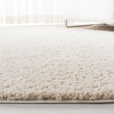 Brittney Performance solid color shag rug