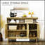 Buffet Boho avec portes en rotin, finition en bois naturel pour un rangement et une présentation élégants dans n'importe quel espace de vie