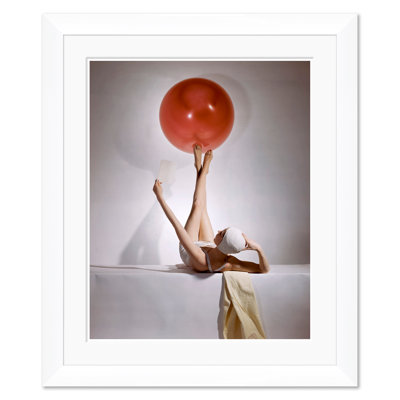 Vogue Magazine, "Model Balancing A Red Ball On Her Feet," Horst P. Horst, May 15, 1941 Print by Horst P. Horst