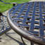Aspen 2 - Person Patio Dining Set Umbrella Hole Included Round Table
