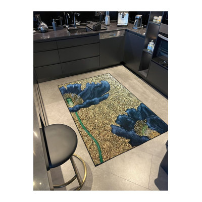 Tapis bleu tissé à motif floral lavable à la machine