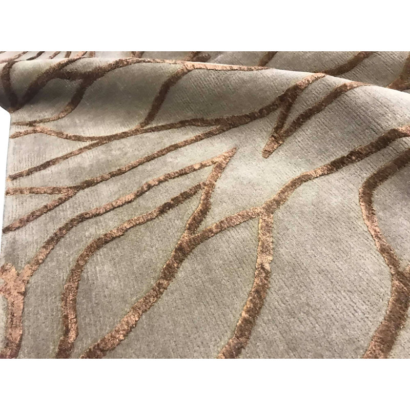Tapis doré de haute qualité noué à la main