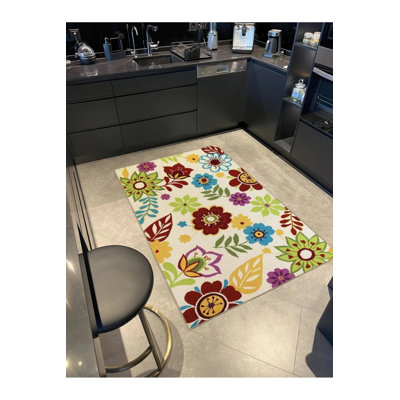 Tapis tissé à motif floral