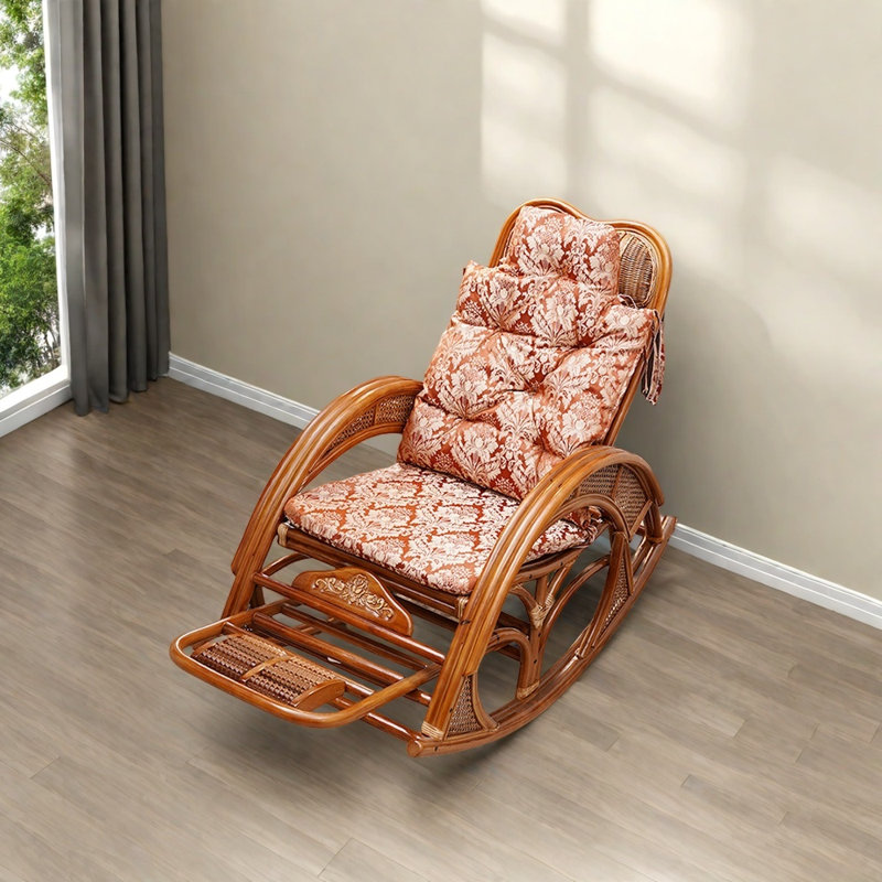 Chaise berçante confortable en rotin