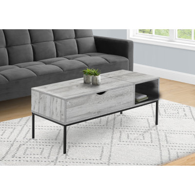 Table basse contemporaine à plateau relevable avec rangement dissimulé et surface de travail réglable