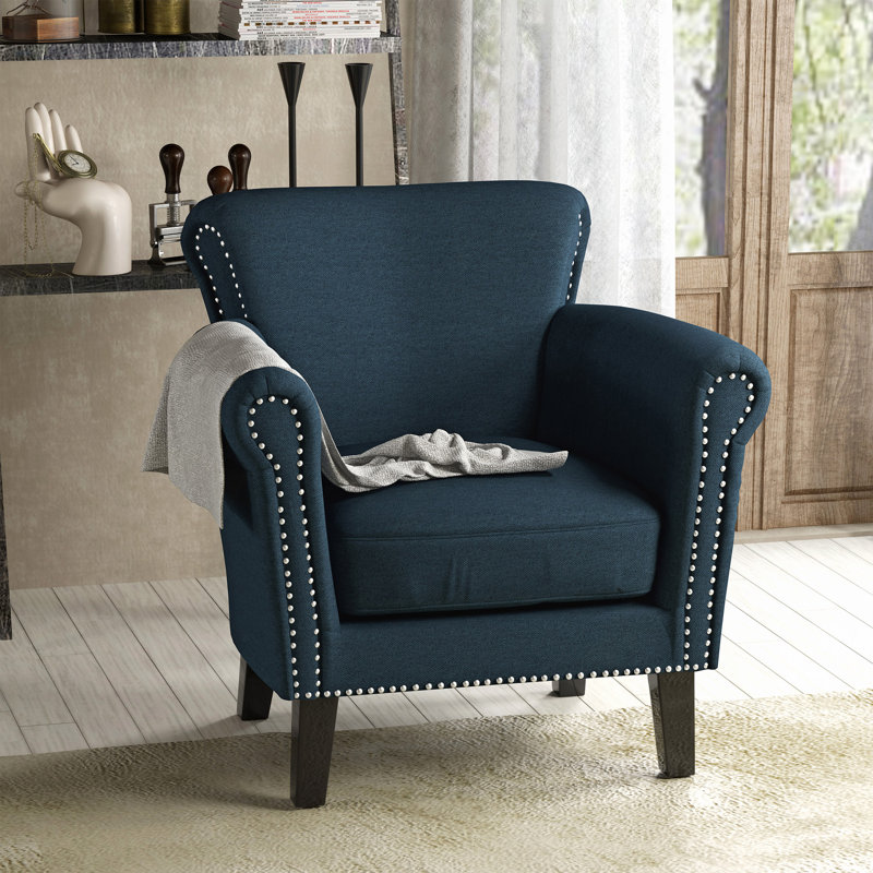Fauteuil club de luxe en tissu - Design incurvé élégant, garniture cloutée, pieds en bois de bouleau