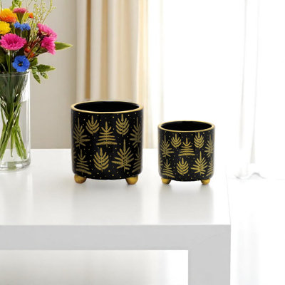 Ensemble de deux pots à fleurs en céramique noire et dorée