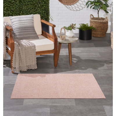 Mullican Sandy Solid Pink Easy Care Indoor/Outdoor Area Rug
