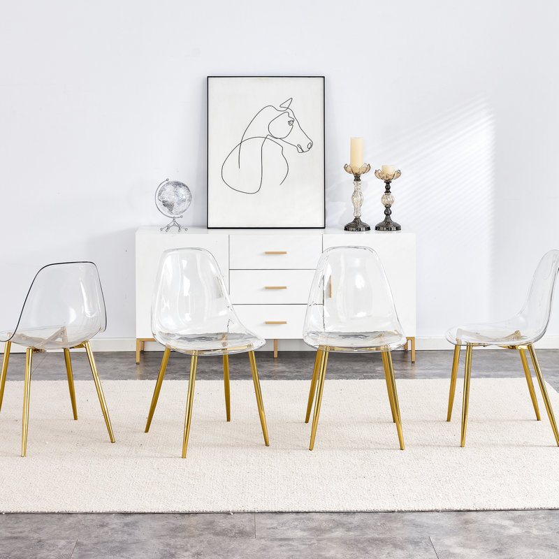 Ensemble de 4 chaises de salle à manger transparentes - Pieds en métal doré, siège confortable, support pour animaux de compagnie, design moderne et élégant, structure simple en plastique, ergonomie