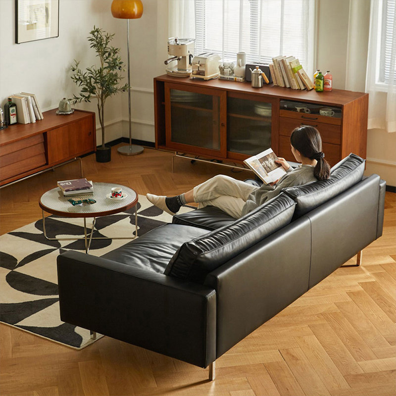 Causeuse-coussin standard en similicuir noir