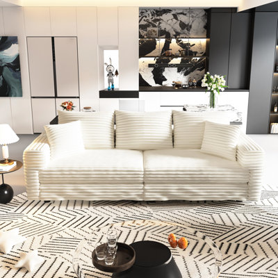 Canapé Cloud 3 places en velours côtelé de 210 cm (82,7 po), revêtement moderne avec poufs assortis amovibles, idéal pour les petits espaces et parfait pour un appartement ou un bureau confortable, supporte jusqu'à 340 kg (750 lb).