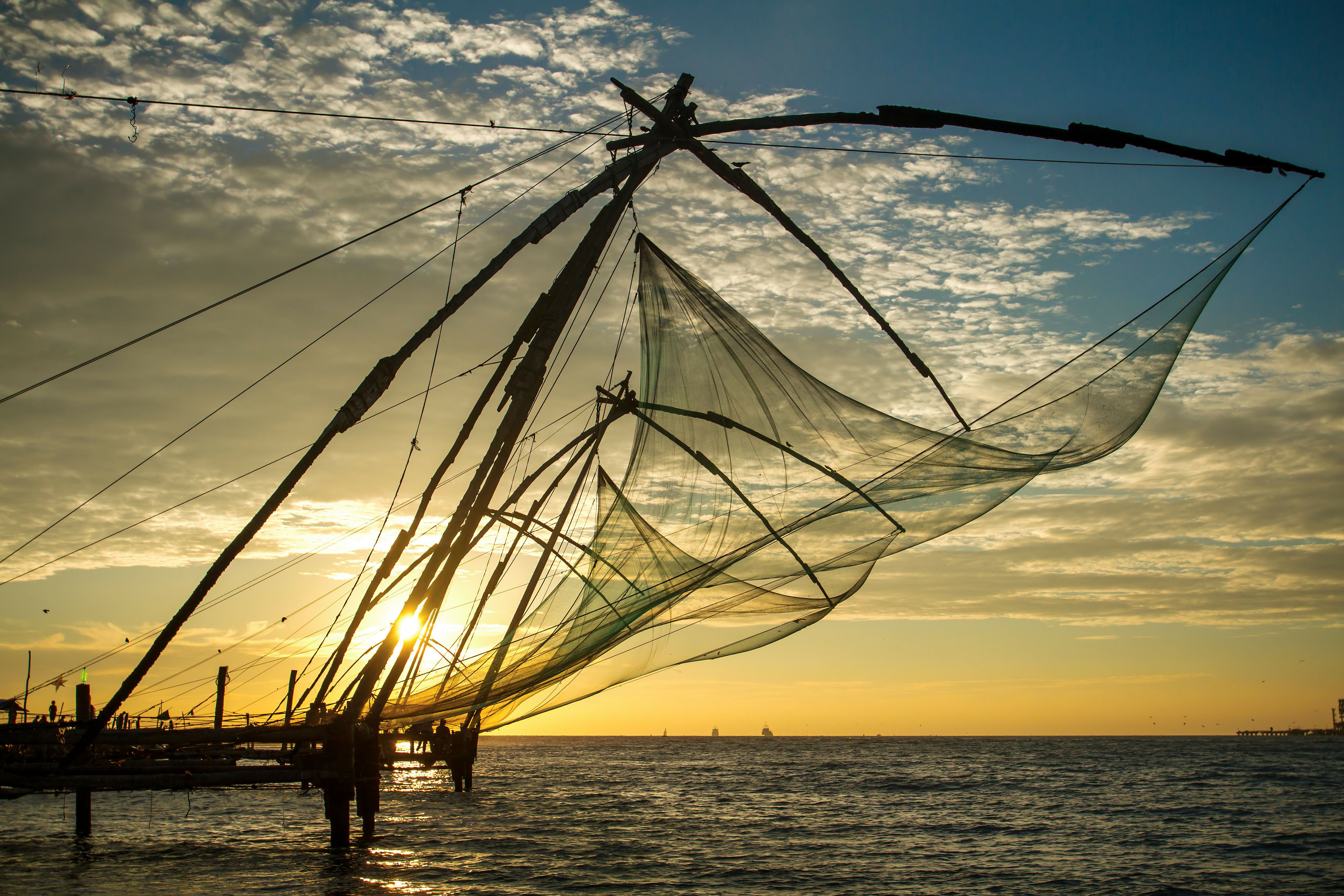 Chinese Fishing Net At Sunrise On Canvas by Mazzzur Print
