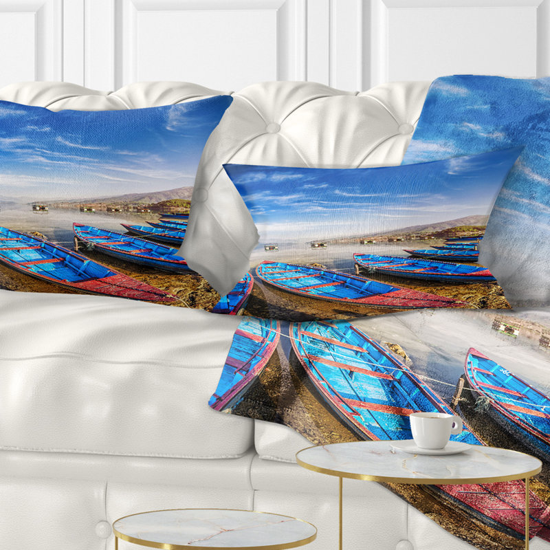 Coussin bleu avec bateaux bleu ciel