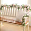 Guirlandes d'eucalyptus avec fleurs-667216793