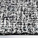 Britley Handmade Tufted Wool Black/White Area Rug