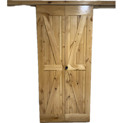 Porte de grange pliante en bois d'aulne fini avec ensemble de quincaillerie coulissante en bois