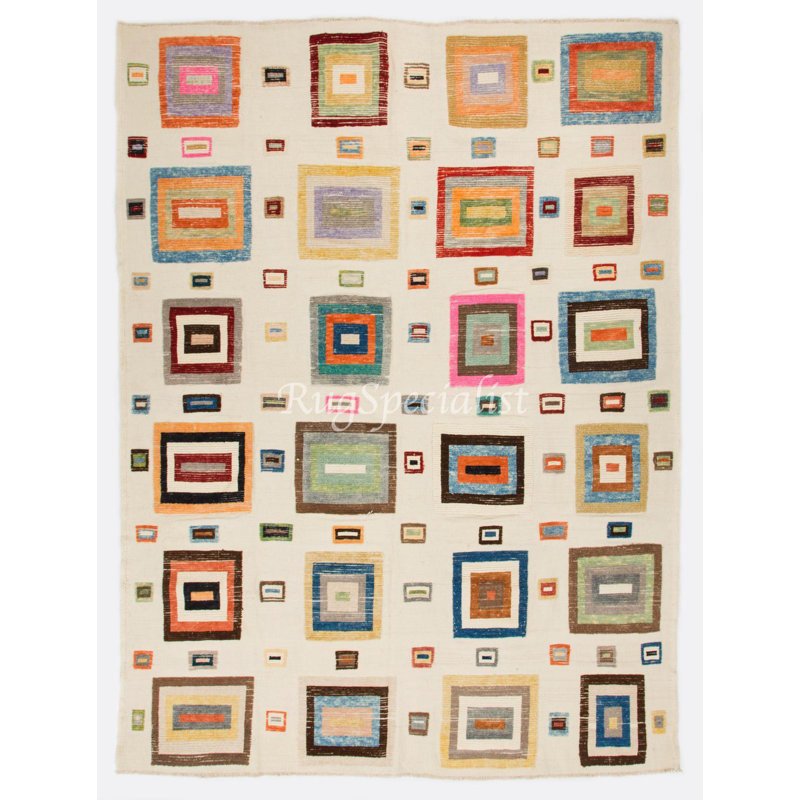Tapis multicolore à poils courts et longs avec motif géométrique, entièrement en laine. Options personnalisées disponibles