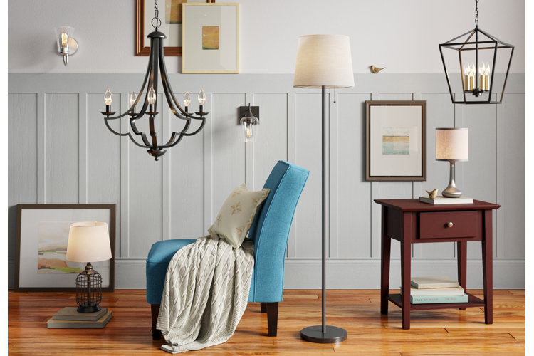 room with various ceiling lights, chandeliers, table lamps, and floor lamps