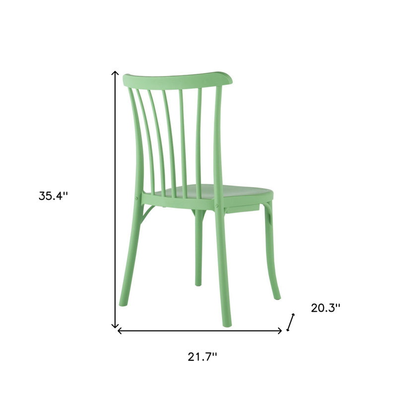 Ensemble de deux chaises de salle à manger d'extérieur empilables en plastique vert