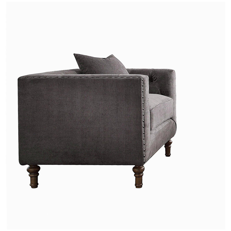 Chaise d'appoint grise avec coussin