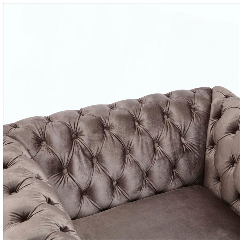 Fauteuil club Chesterfield pour un siège confortable dans le salon ou le salon