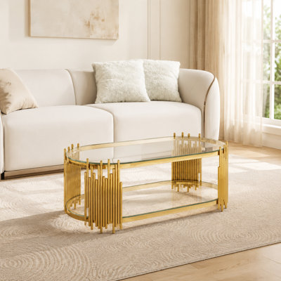 Table basse moderne ovale centrale avec tablettes en verre trempé à 2 niveaux, structure en métal poli robuste, conception unique de tuyaux d'orgue artistique, rangement ouvert fonctionnel pour le salon, coins arrondis sécuritaires pour les maisons avec enfants et animaux de compagnie