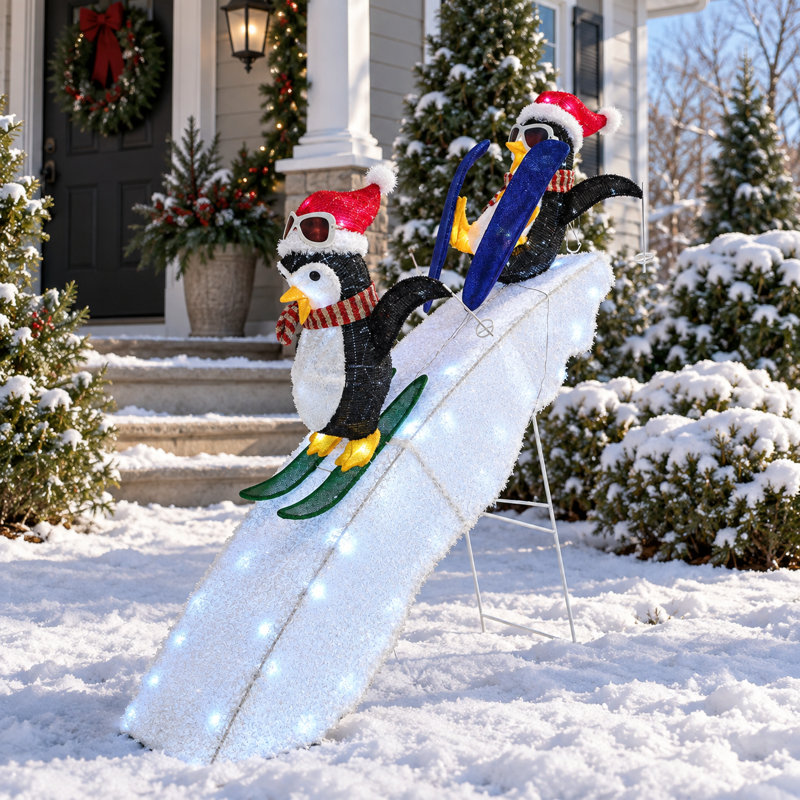 Duo de pingouins skieurs joueurs de 1,20 m sur une piste enneigée - Décoration lumineuse de Noël pour jardin