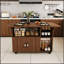 Table pliante multifonctionnelle avec tablettes et roulettes de rangement, idéale pour les petits espaces et polyvalente dans la cuisine, le dortoir ou le bureau