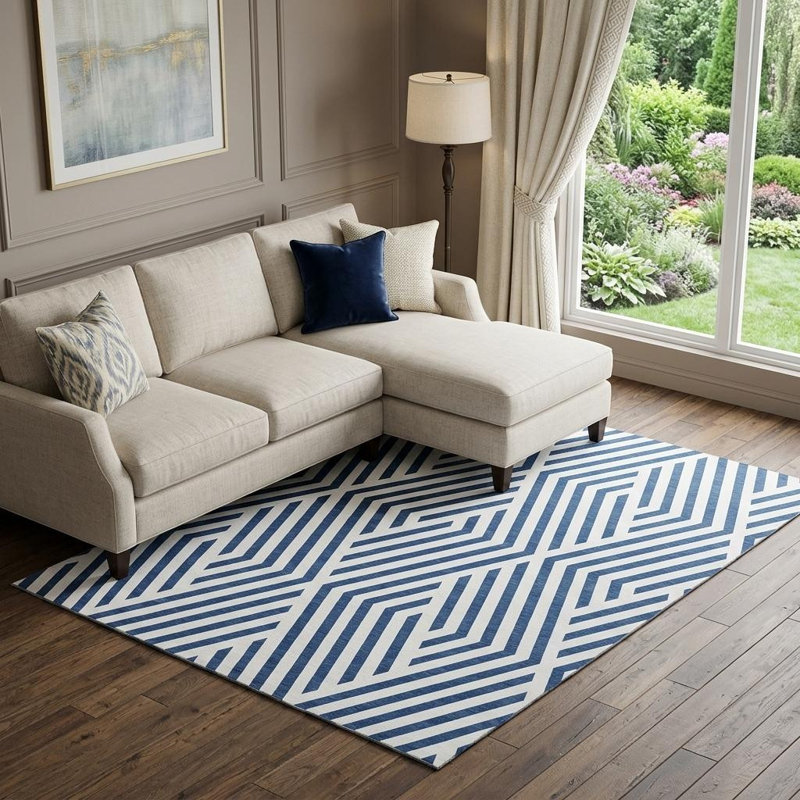 Tapis lavable géométrique bleu marine et ivoire 8 pi x 10 pi avec protection UV