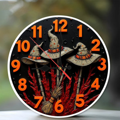 Horloge avec balai de sorcière