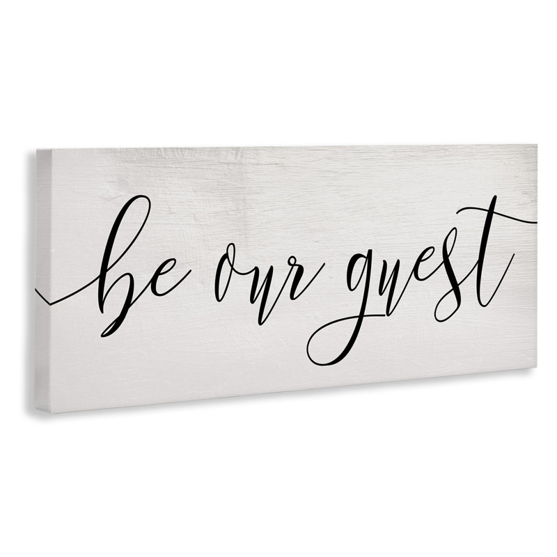 Be Our Guest Script White Wood Look by Daphne Polselli - Graphic Art Print, 10" H x 24" W