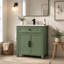 Meuble-lavabo sur pied de 70,2 cm (27,64 po) avec rangement, design moderne du milieu du siècle, armoire peinte en vert, lavabo en céramique et poignées en métal