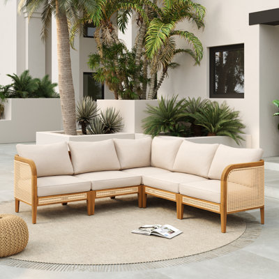 Alvie Modern Outdoor Acacia Wood Sectional Sofa With V-Shaped Frame And Woven Cane Accents