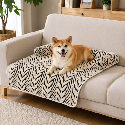 Black 35.43 x31.5 inch calming couch mat for small and medium dogs and cats, with neck and head support, soft Flanne couch-cover material, non-slip backing, and machine-washable construction that protects sofas from fur and scratches.