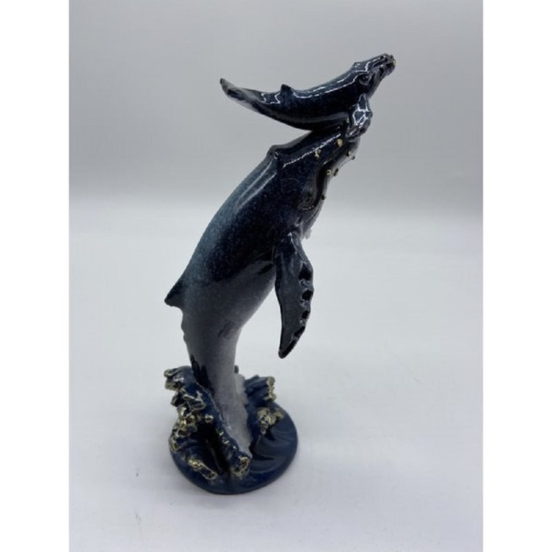 Baleine Lytchett et veau sur la vague