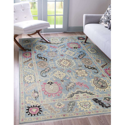 Tapis traditionnel bleu clair en laine noué à la main clair