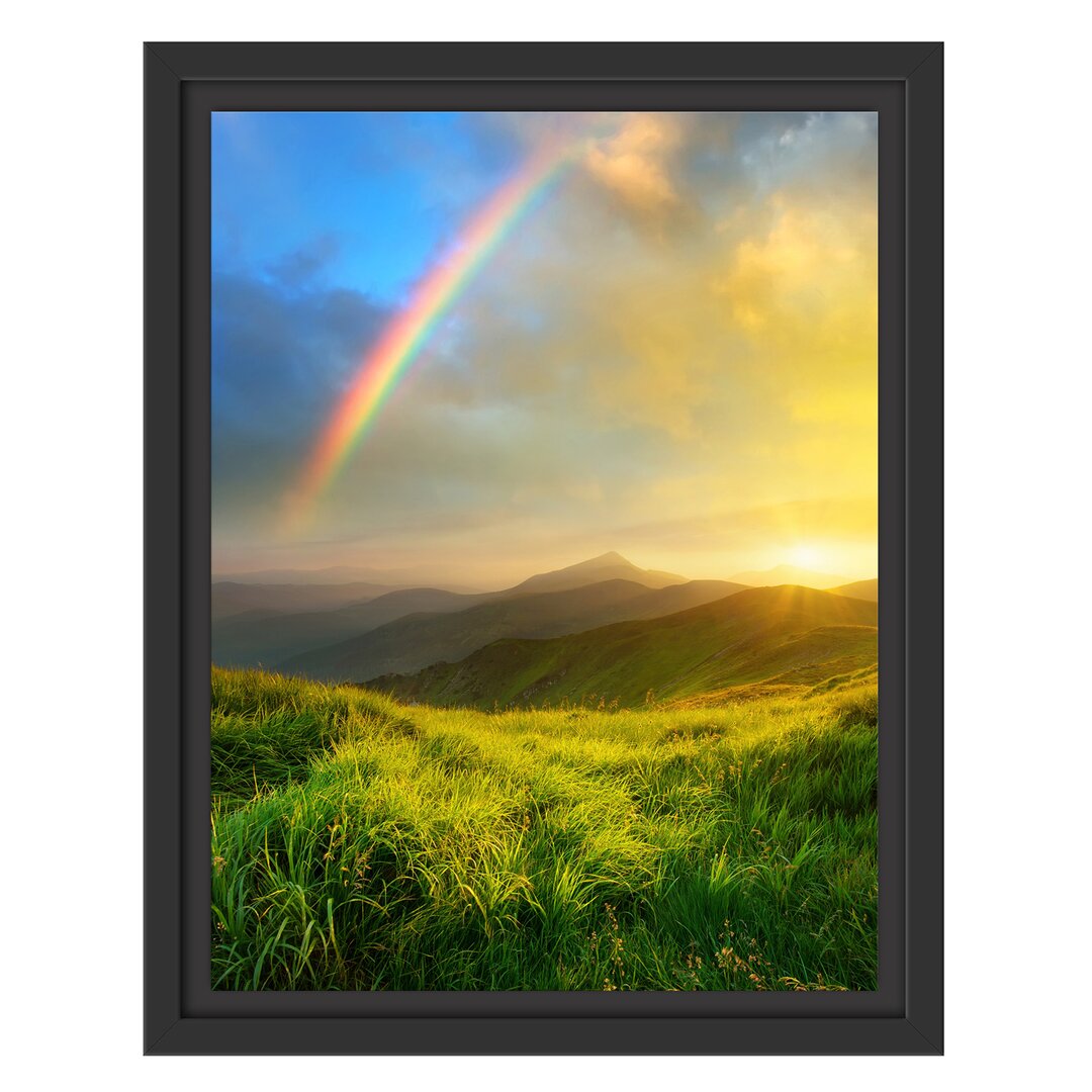 Gerahmtes Wandbild Berge mit Regenbogen am Himmel