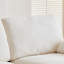 Canapé d'angle modulaire Cloud Couch, confort optimal. Sans compression sous vide. Garnissage en duvet et coton. Housses lavables - 3 places, blanc cassé.
